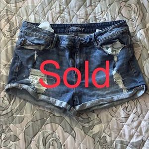 Distressed jean shorts